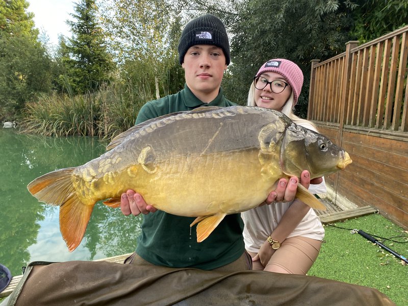 Jason and his girlfriend Chloe with a 26lb Cherry Mere Mirror