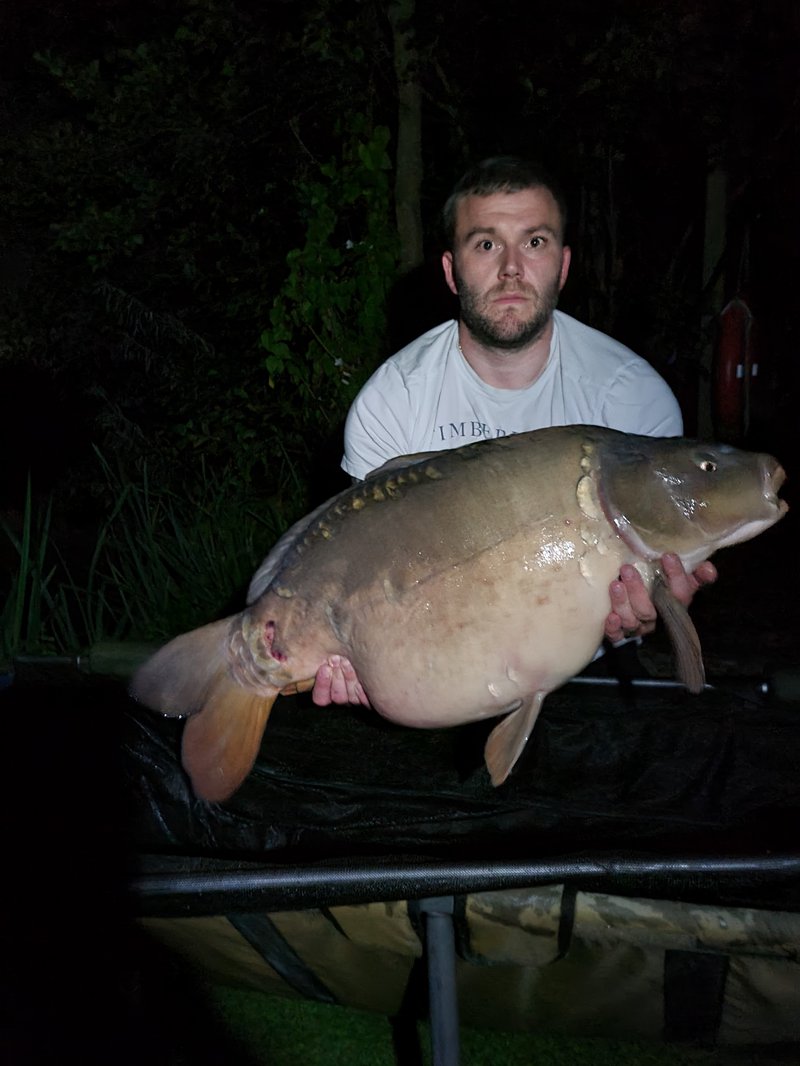 Aaron holding Charlotte Hull's 37-12 PB