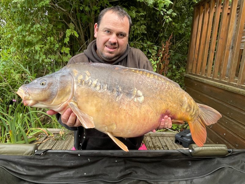 John Hudson with his biggest Carp of the weekend, a 37-08 Mirror