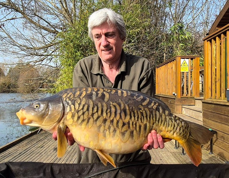 Andy Watts with a beautiful early Spring Mirror from Cherry Lake