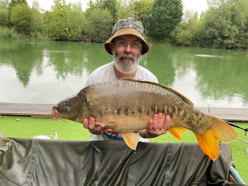 Dan Barton with a Cherry Pool Carp of 24-08. One of 30+ Carp last week.
