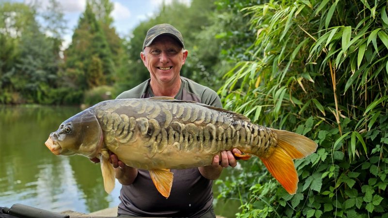 Ken Dack with a lovely 25lb Mirror from Cherry Pool