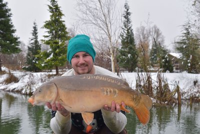Adam Bowyer with a great trophy shot. An 18-08 Mirror in the snow!