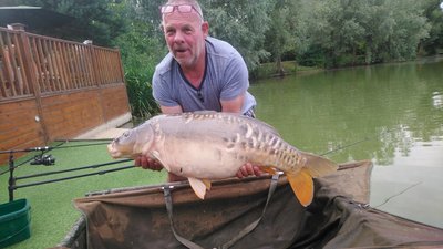 Andy Marshall with a 28lb Cherry Mere Mirror. The biggest of his trip to date.