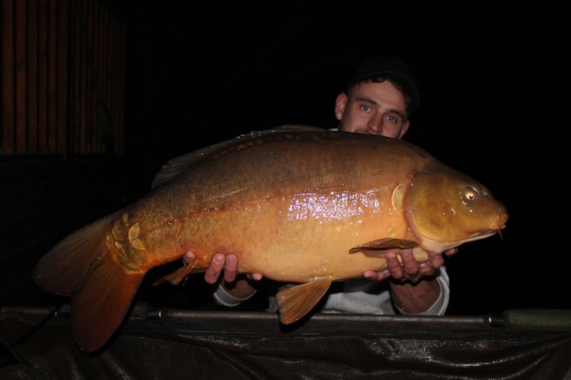 George Kosmetos with a very 'leathery' Mirror of 29-06 from Osprey Lodge on Cherry Lake.JPG