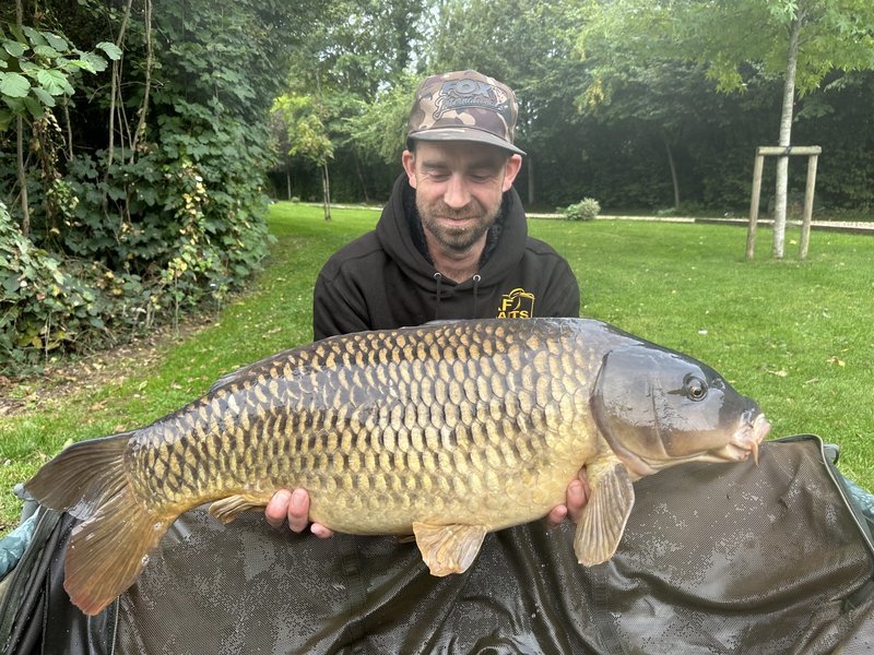 Ross Kirk with a 31lb Common from the Cottage.