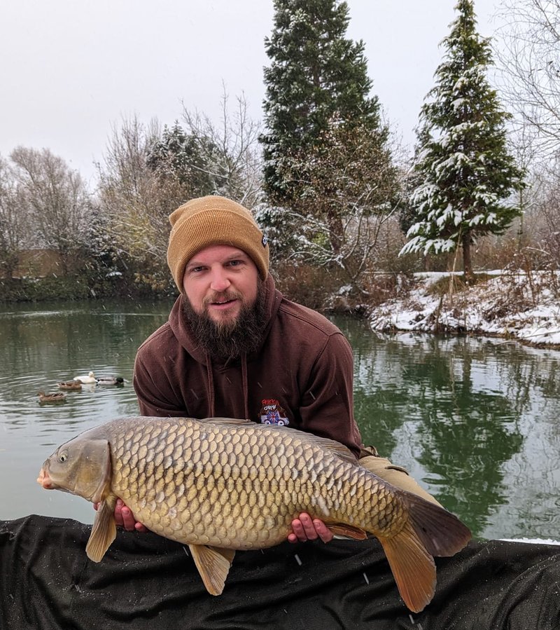 Liam Steer with his 'Snow Carp', a 22lb Common.
