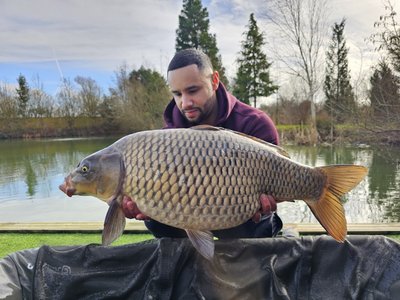 LLoyd Carty with an immaculate 22lb Common from Pochard Lodge