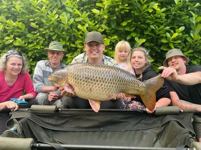 Luke Williams with a great family shot and a 34lb Common