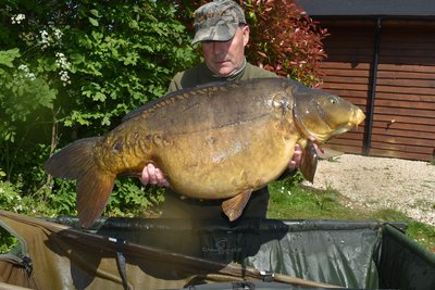 Malcolm Dix with a 39-02 Mirror carp from Grebe Lodge
