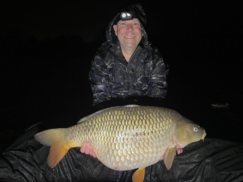 Neil Taplin with a 34lb Common from Heron Lodge on Cherry Lake
