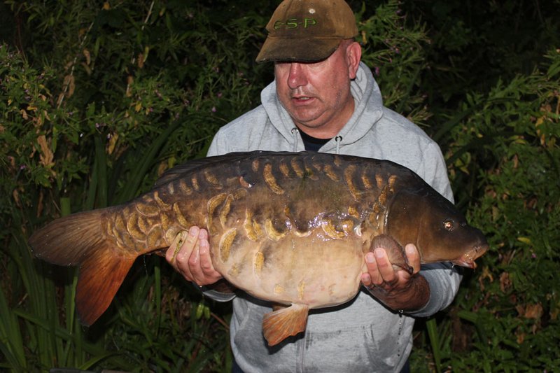 Vince Rolfe with his new PB, a cracking Cherrry Lake Mirror of 28-12 from Heron Lodge