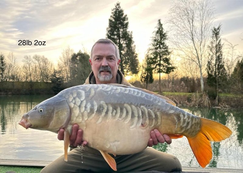Dave Shaw with a lovely 28lb Mirror from Pochard Lodge
