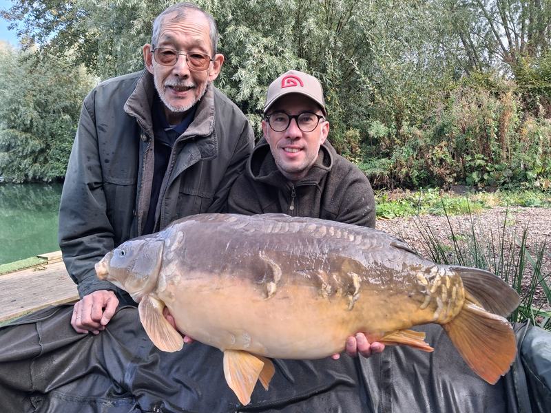 Ken Chow and his Dad with a 30lb Cherry Springs Mirror from Kingfisher Lodge