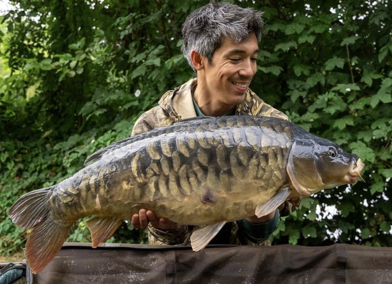 Sam Allison with a stunning 27lb Mirror from the Cottage.